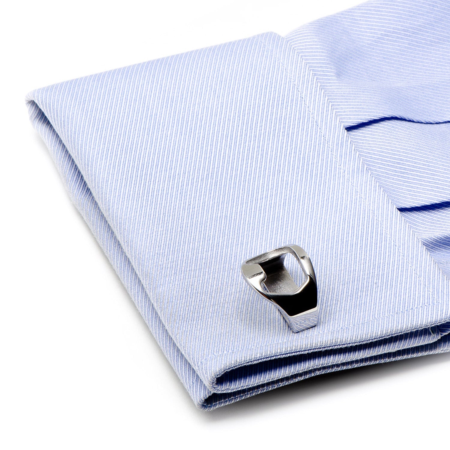 Folded light blue striped fabric with a metal clasp on a white background