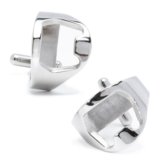 Pair of silver cufflinks on a white background