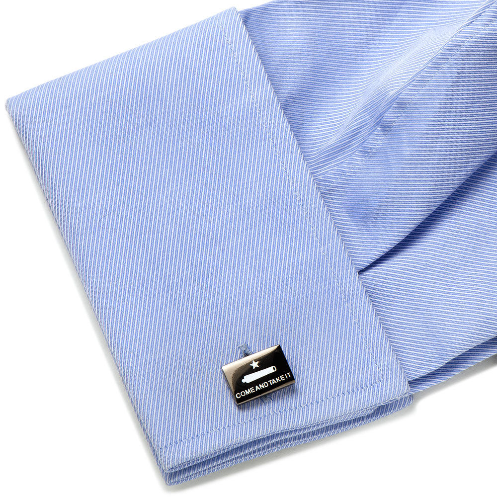 Folded blue striped shirt with a visible label on a white background