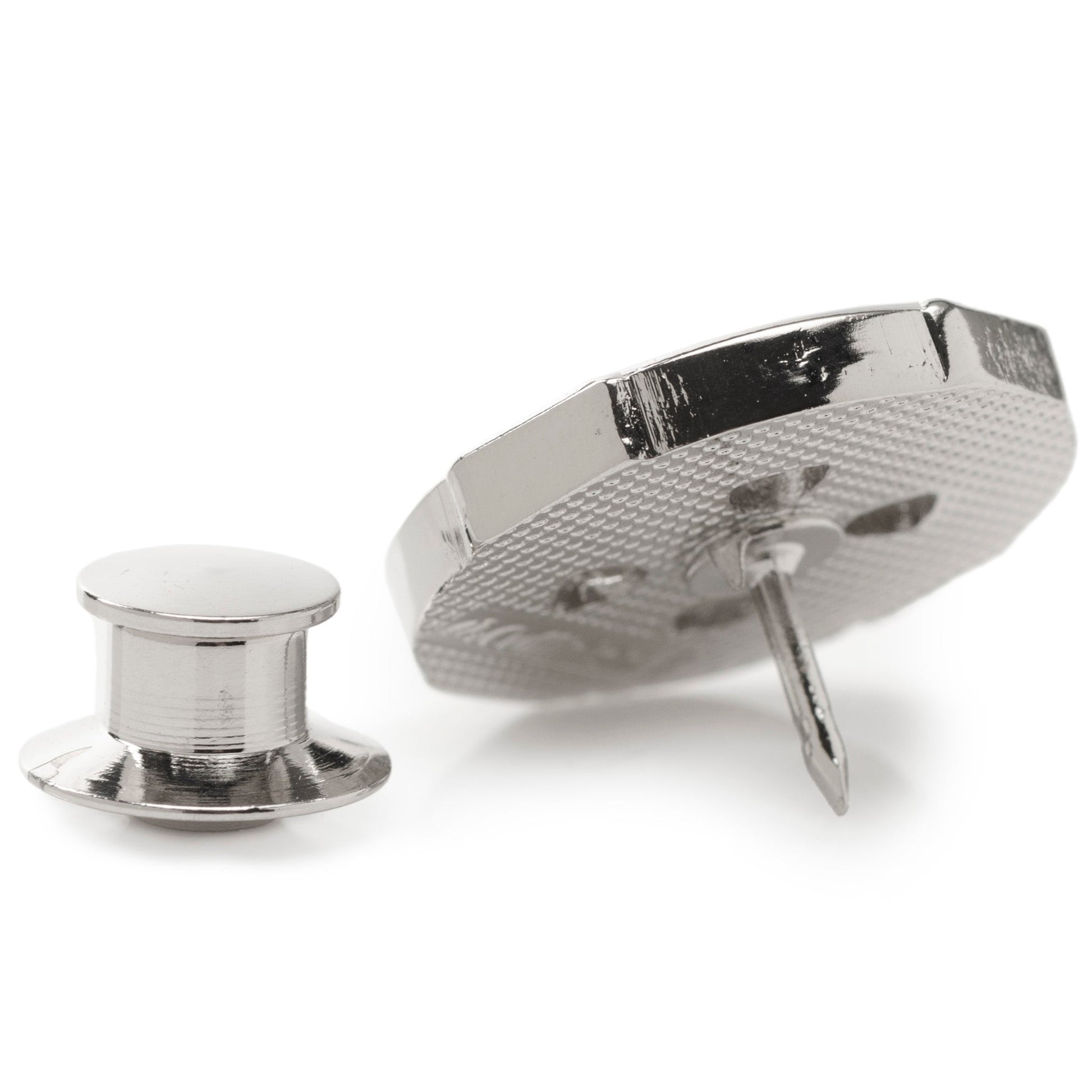 Silver textured cufflinks on a white background