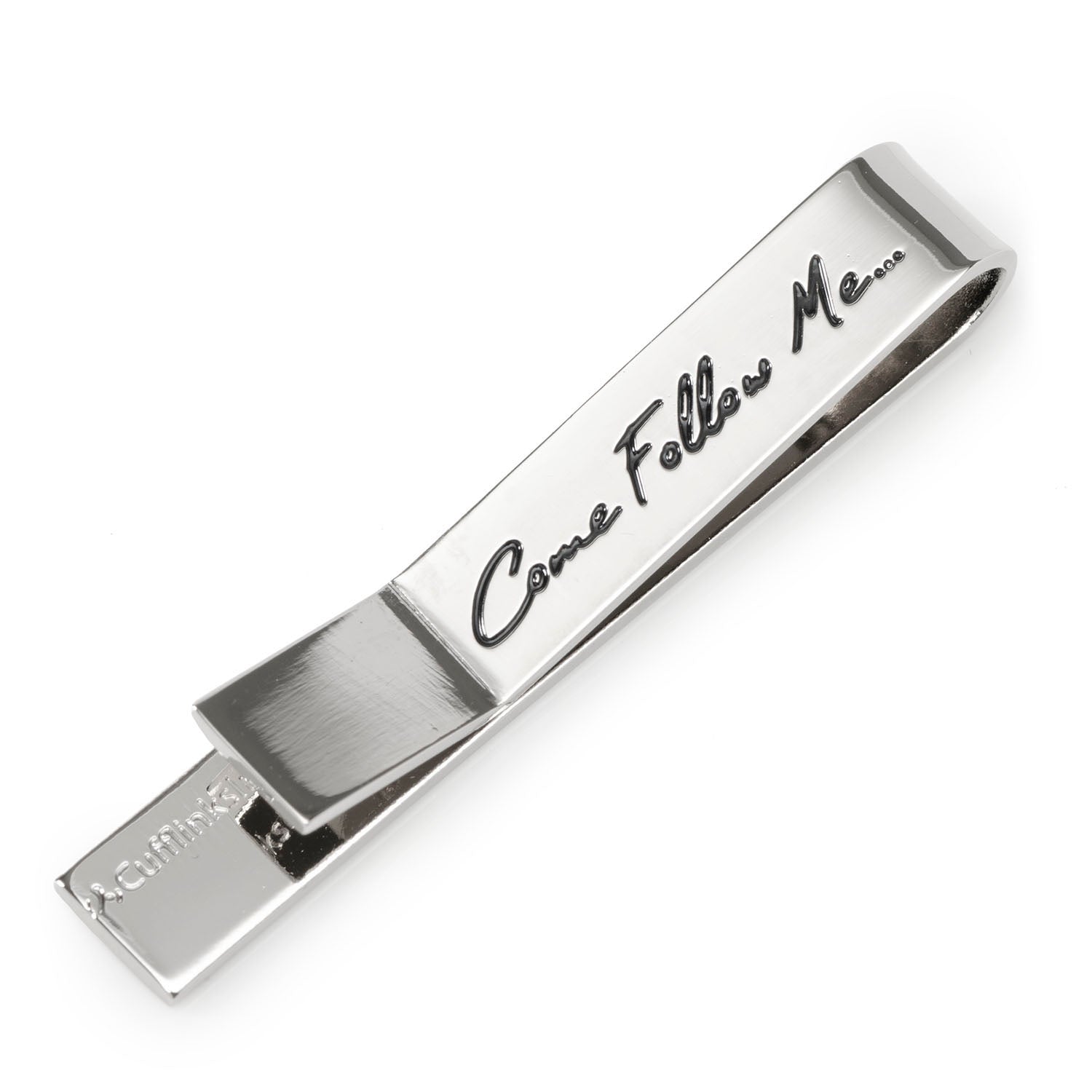 Silver tie clip with 'Come Follow Me' engraving on a white background