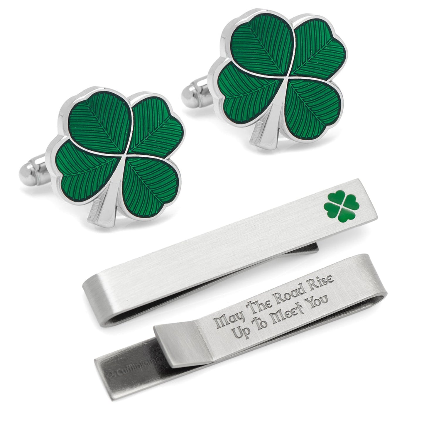 Set of shamrock cufflinks and tie bars on a white background