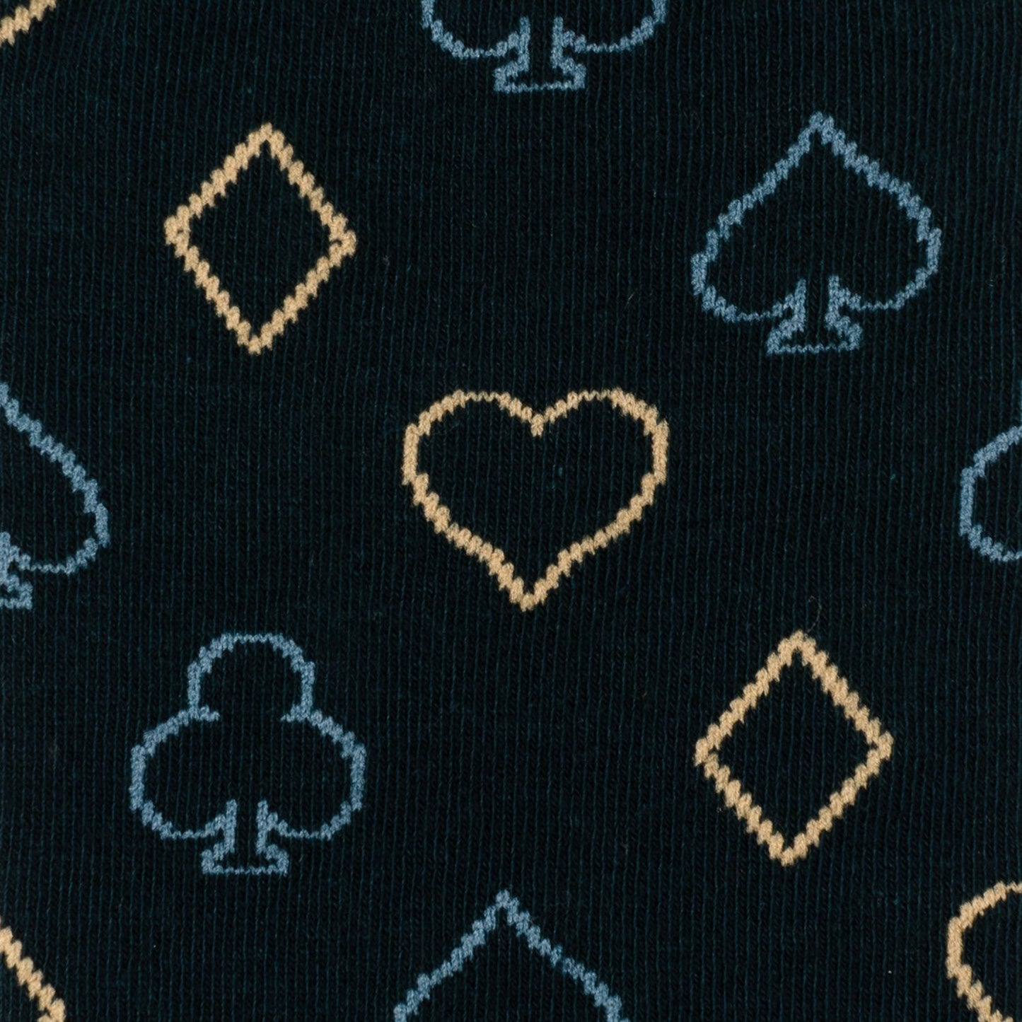 Pattern of card suits on a black background