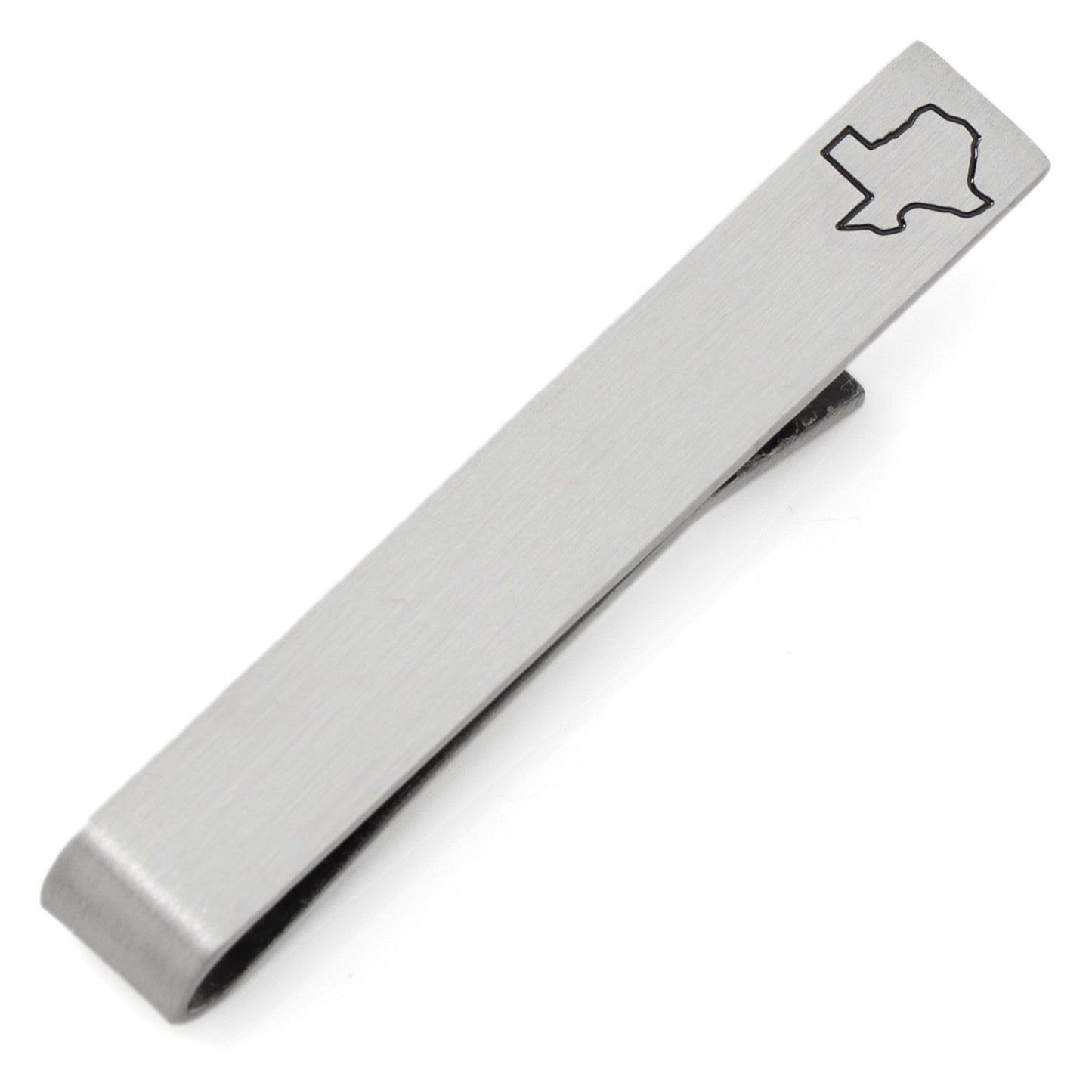 Silver tie clip with Texas outline design on a white background