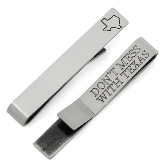Silver tie clip and money clip with 'Don't Mess with Texas' text on a white background