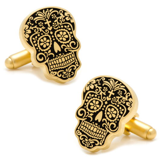 Gold skull cufflinks with intricate black designs on a white background Gold Day of the Dead Cufflinks