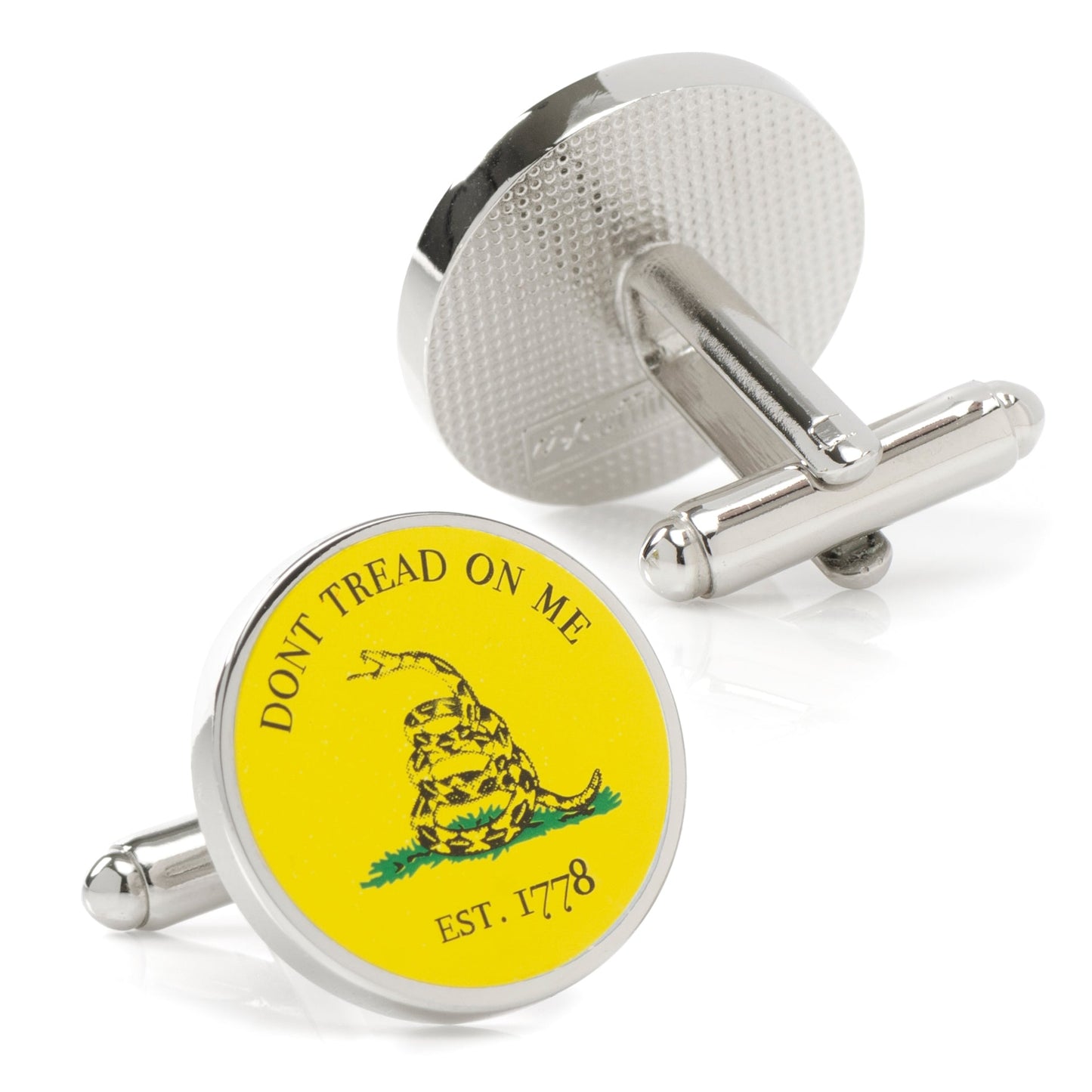 Cufflinks with a yellow round emblem featuring a snake and text on a white background