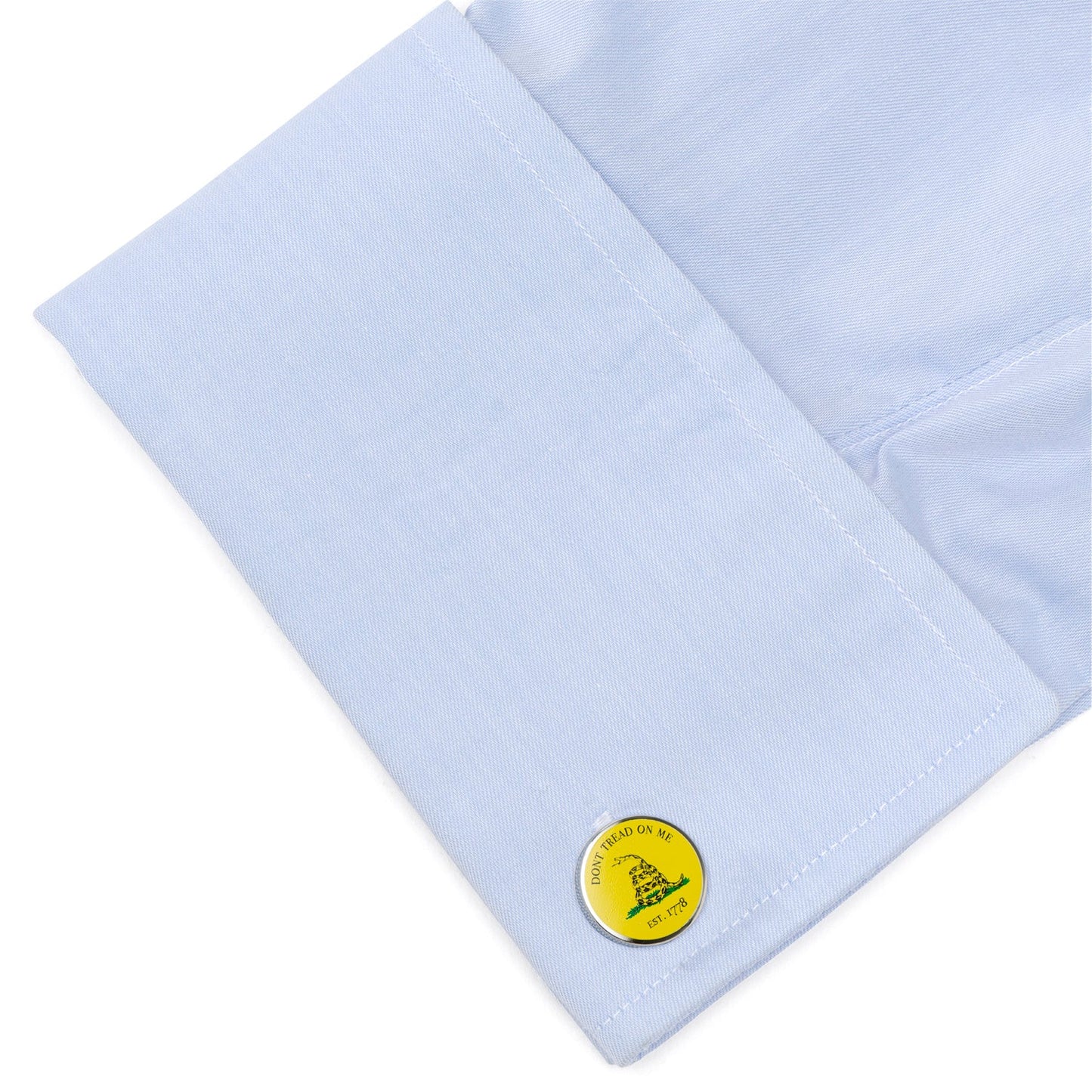 Light blue pocket square with a yellow button featuring a logo on a white background