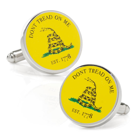 Cufflinks with 'Don't Tread on Me' design on a yellow background
