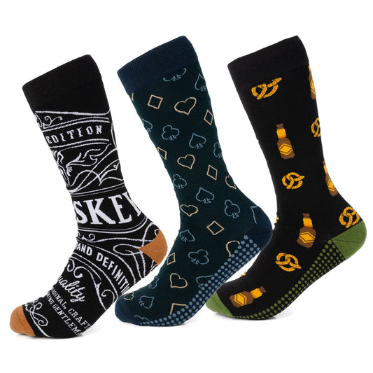 Three pairs of socks with different designs on a white background