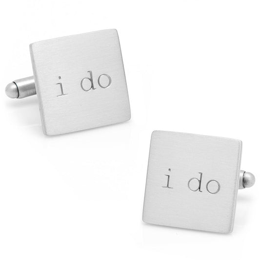Silver square cufflinks with 'i do' engraving on a white background