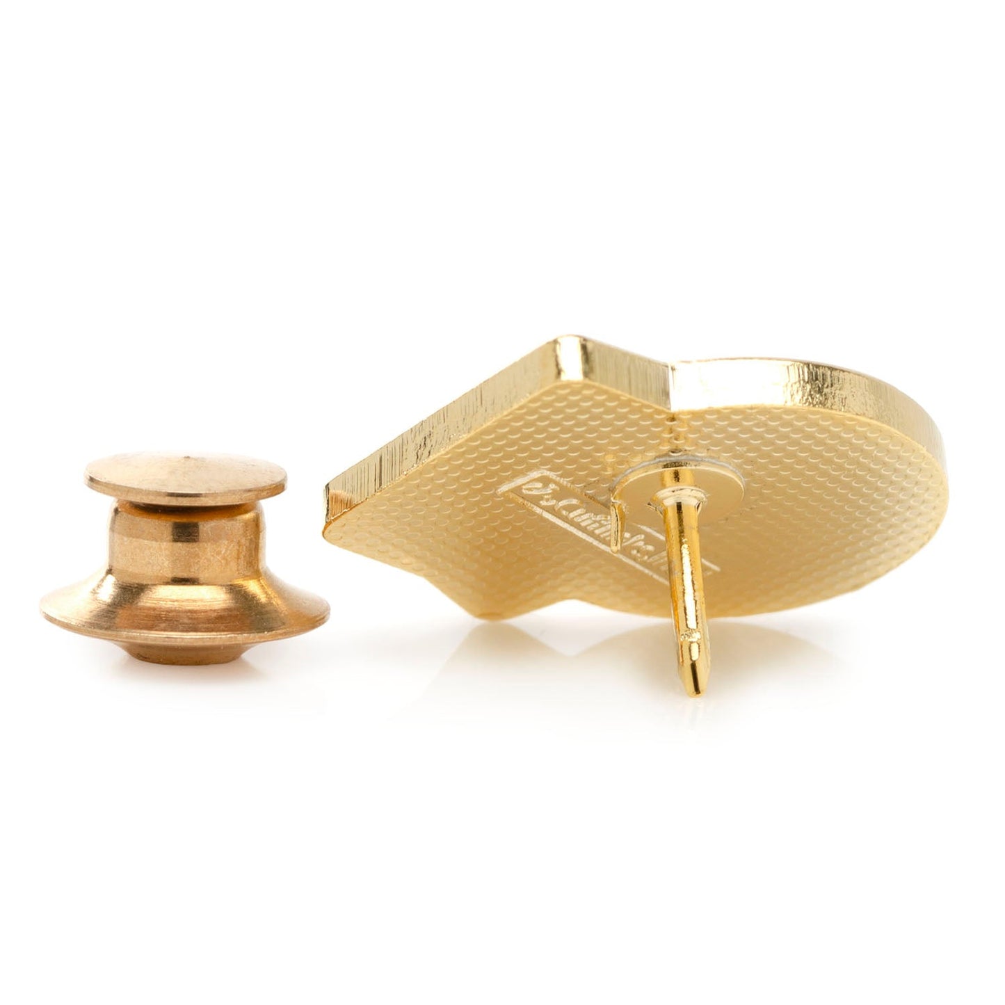 Gold cufflinks on a white background