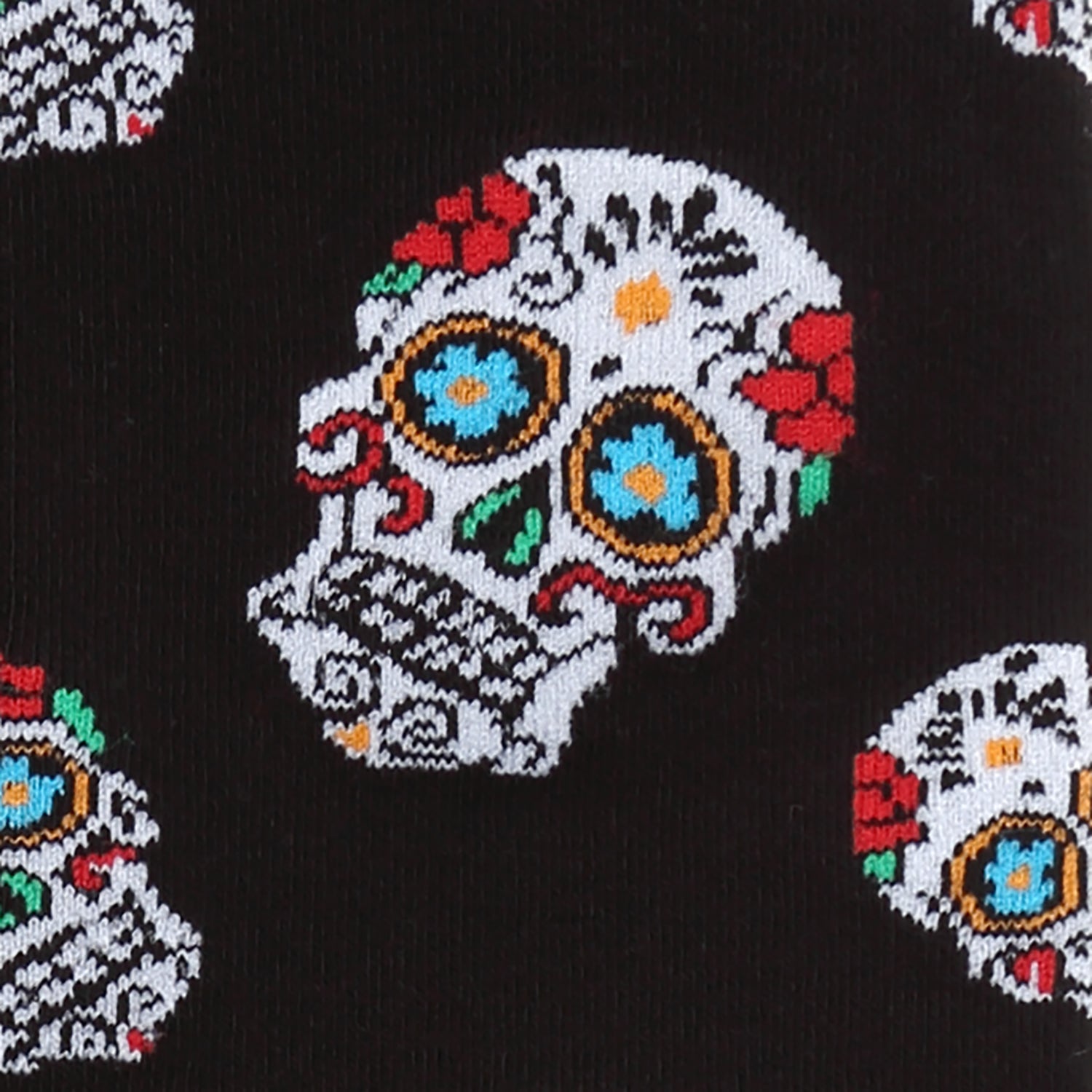 Colorful sugar skull design on a black background