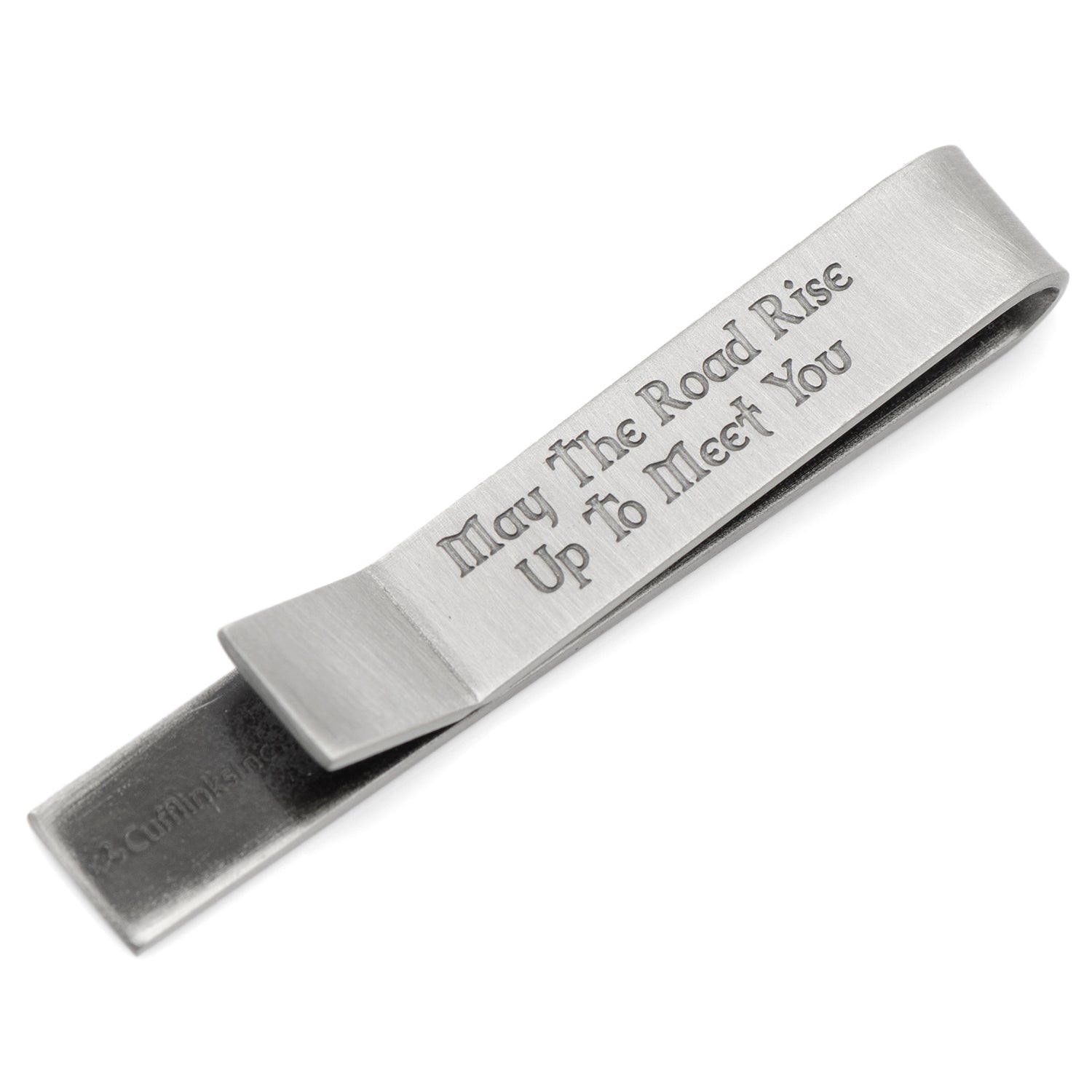 Silver money clip with engraved text on a white background