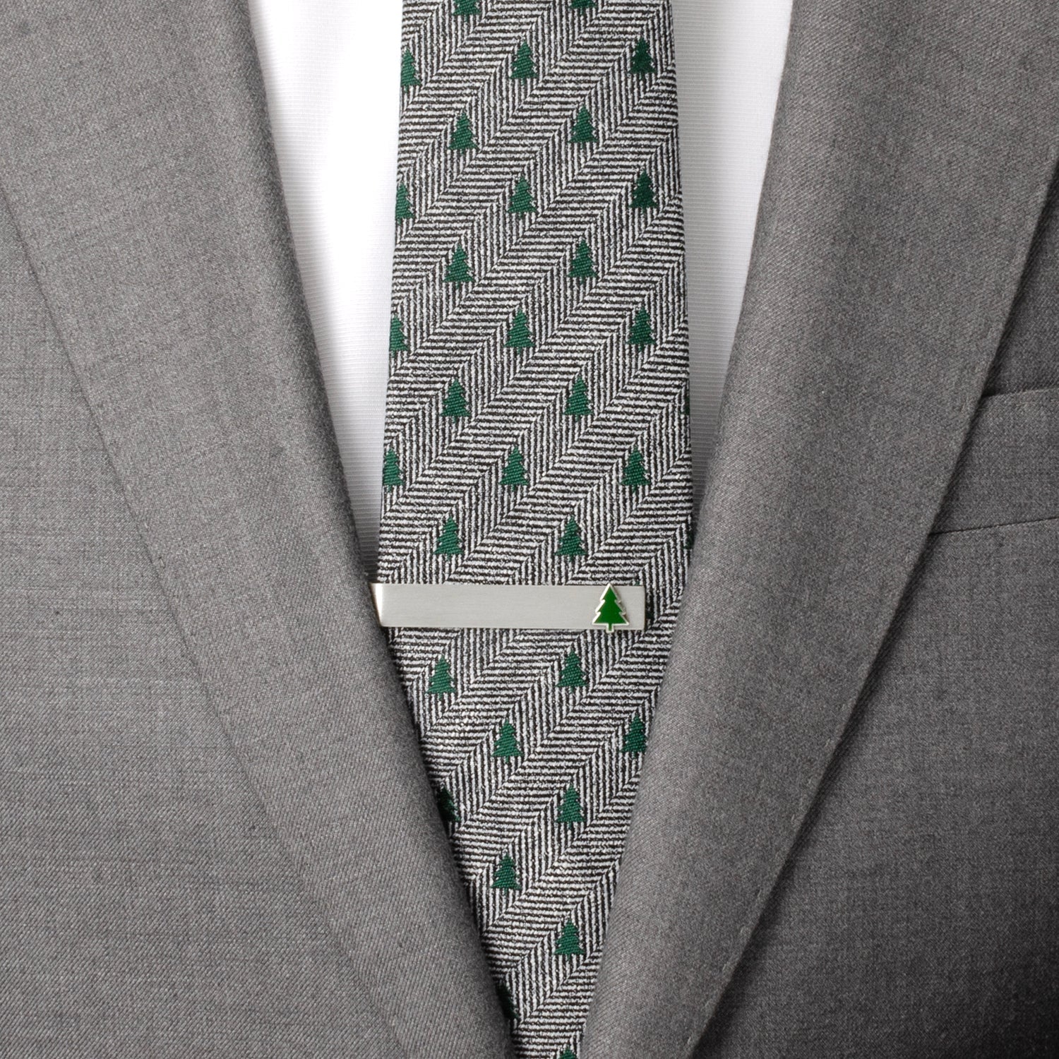 Gray suit jacket with a patterned tie and white shirt
