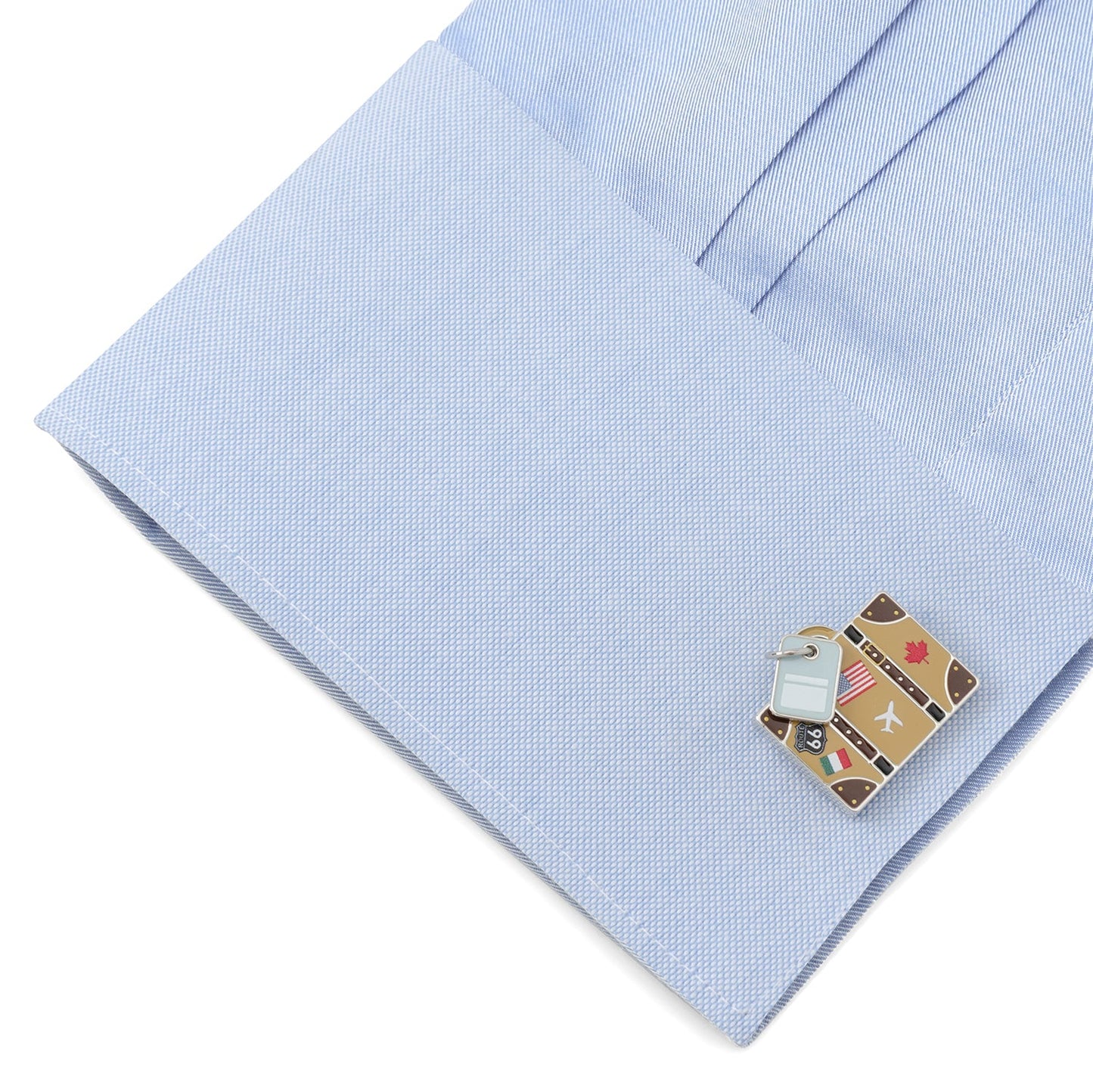Cufflink on a light blue shirt