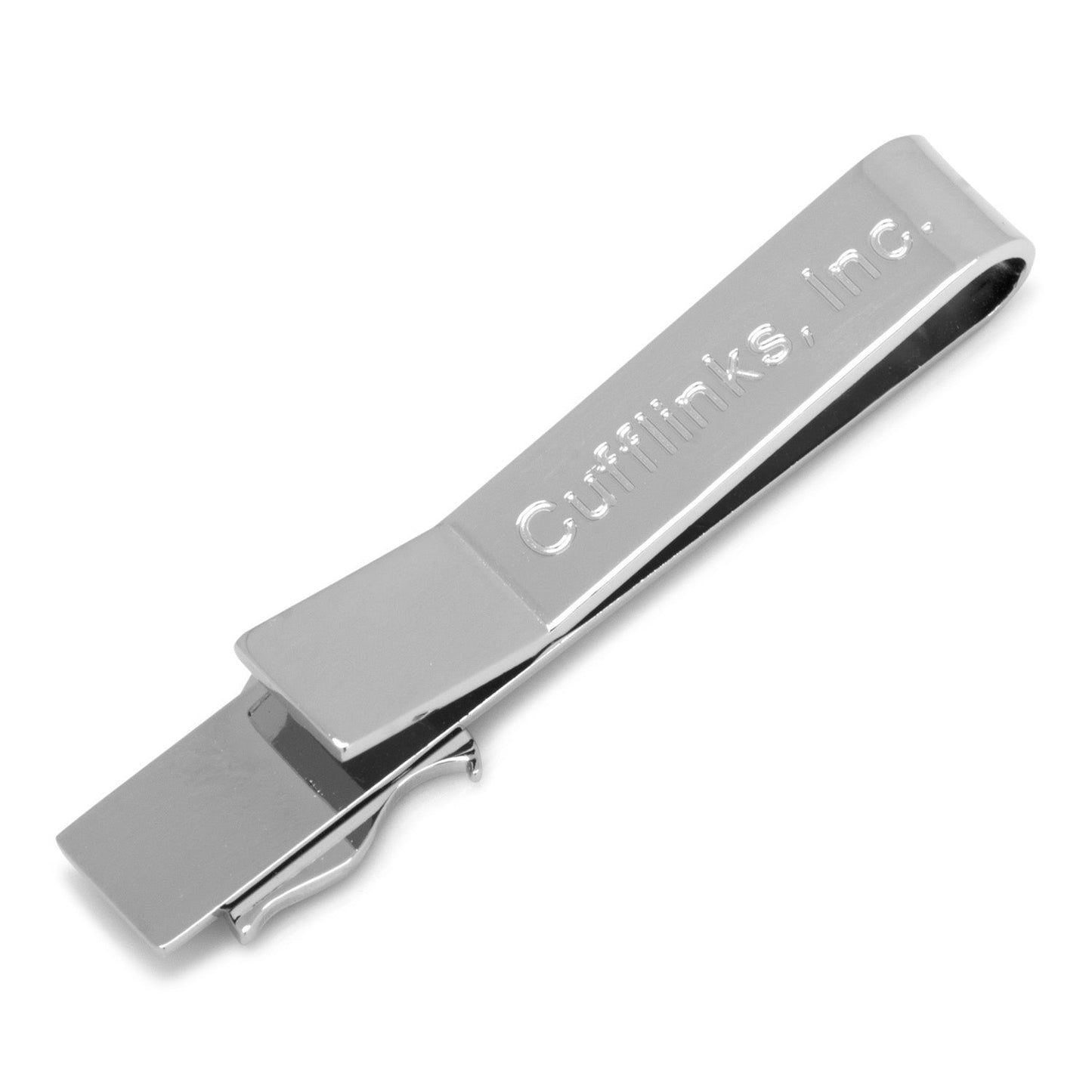 Silver tie clip with 'Cufflinks, Inc.' engraving on a white background