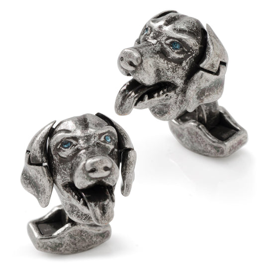 Pair of silver dog head cufflinks on a white background