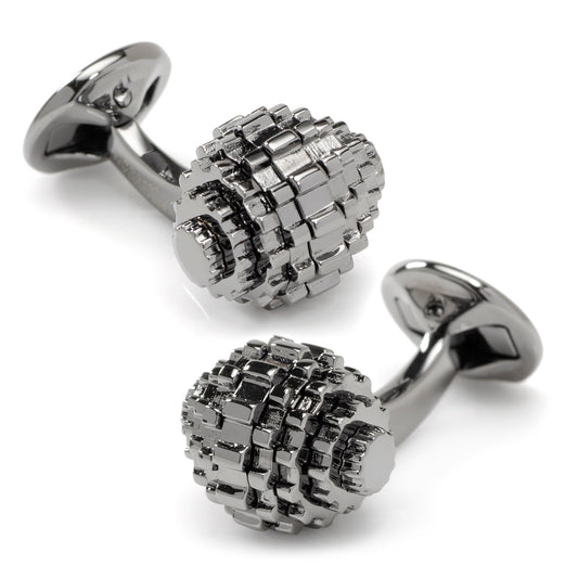Pair of silver cufflinks with a textured design on a white background