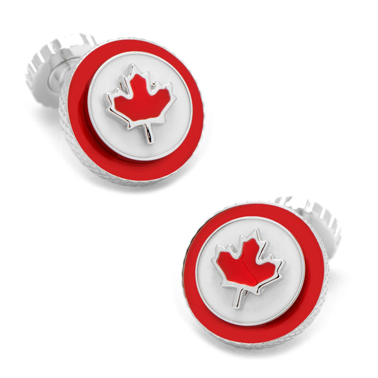 Cufflinks with red and silver maple leaf design on a white background