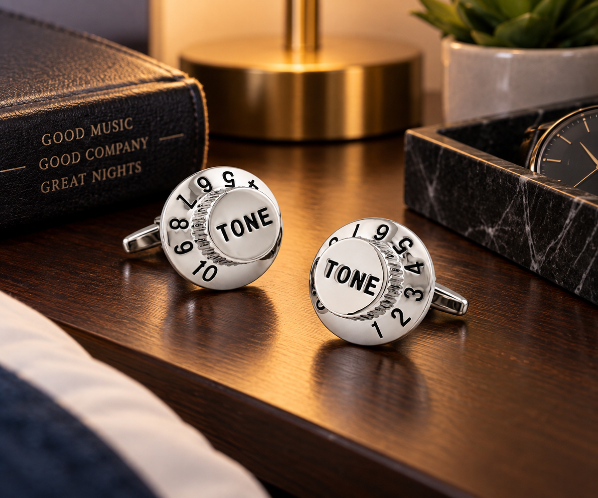 Guitar Tone Knob Cufflinks sitting on nightstand 