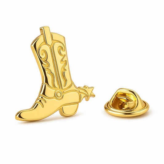Gold cowboy boot-shaped lapel pin on a white background
