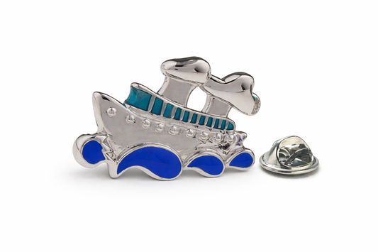 Sailboat-shaped pin with blue accents on a white background