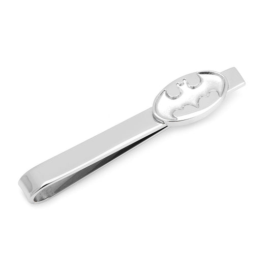 Silver tie clip with a batman emblem on a white background
