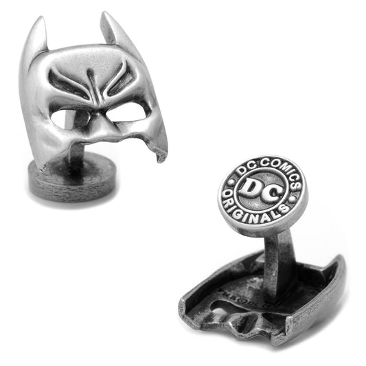 Silver Batman mask cufflinks with DC Comics logo on a white background