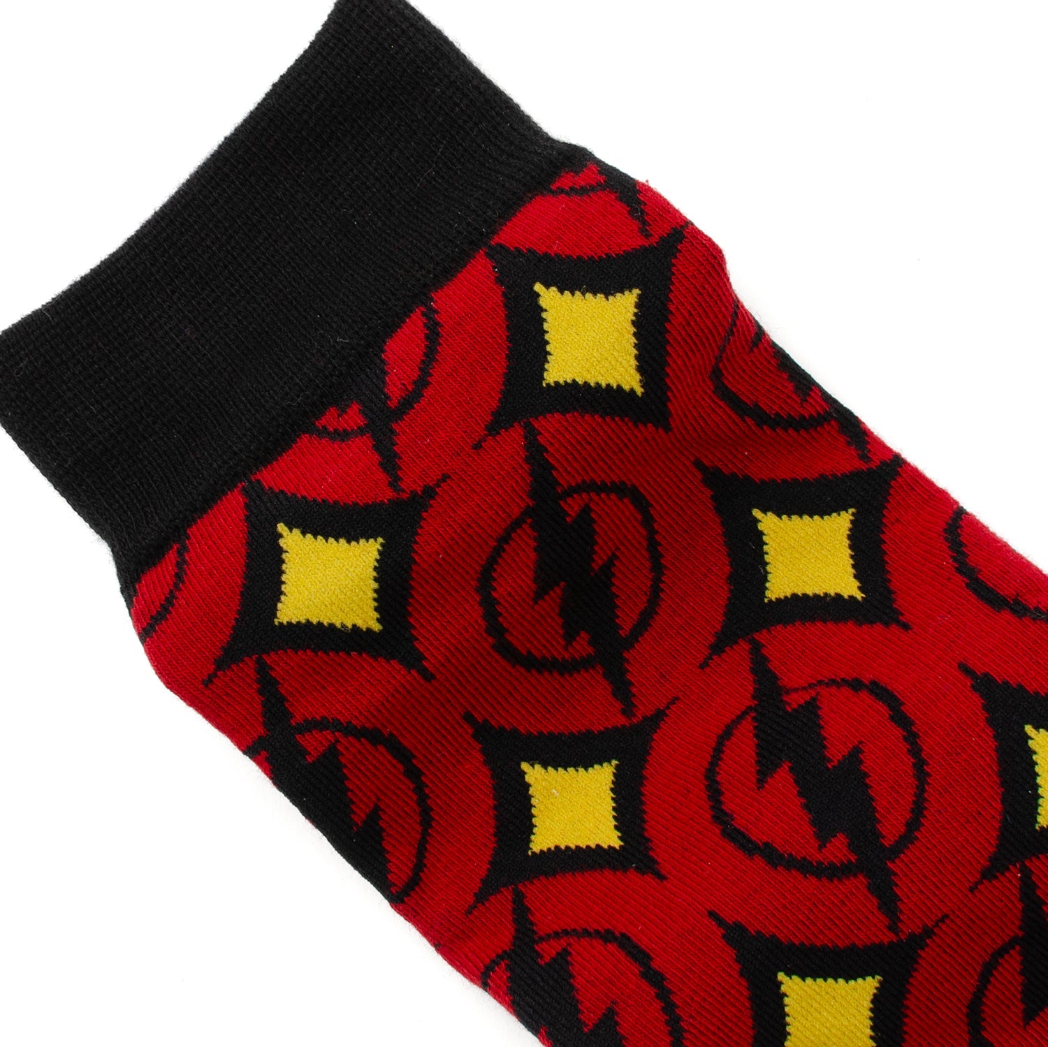 Red socks with black lightning bolt pattern on a white background