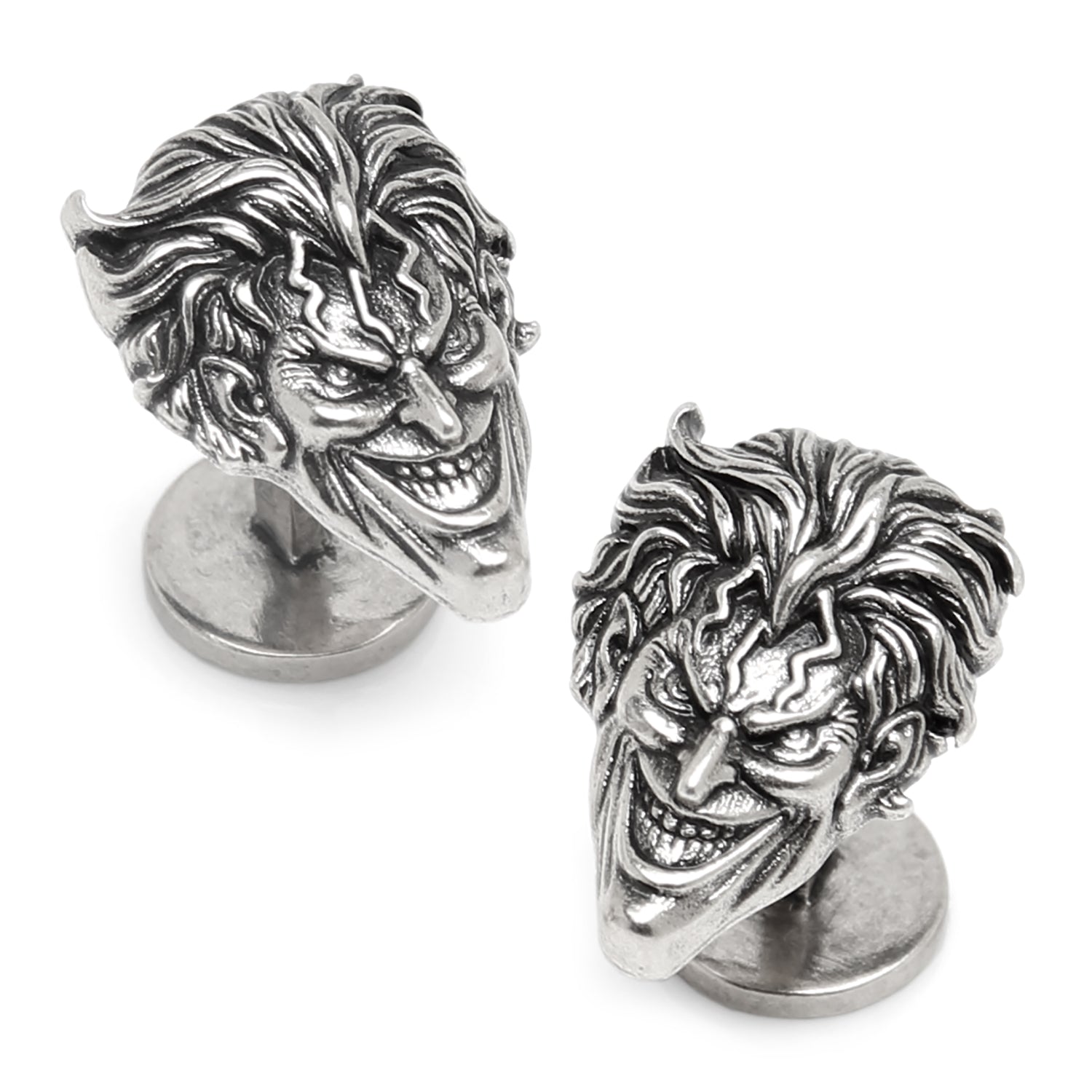 Pair of silver wolf head cufflinks on a white background