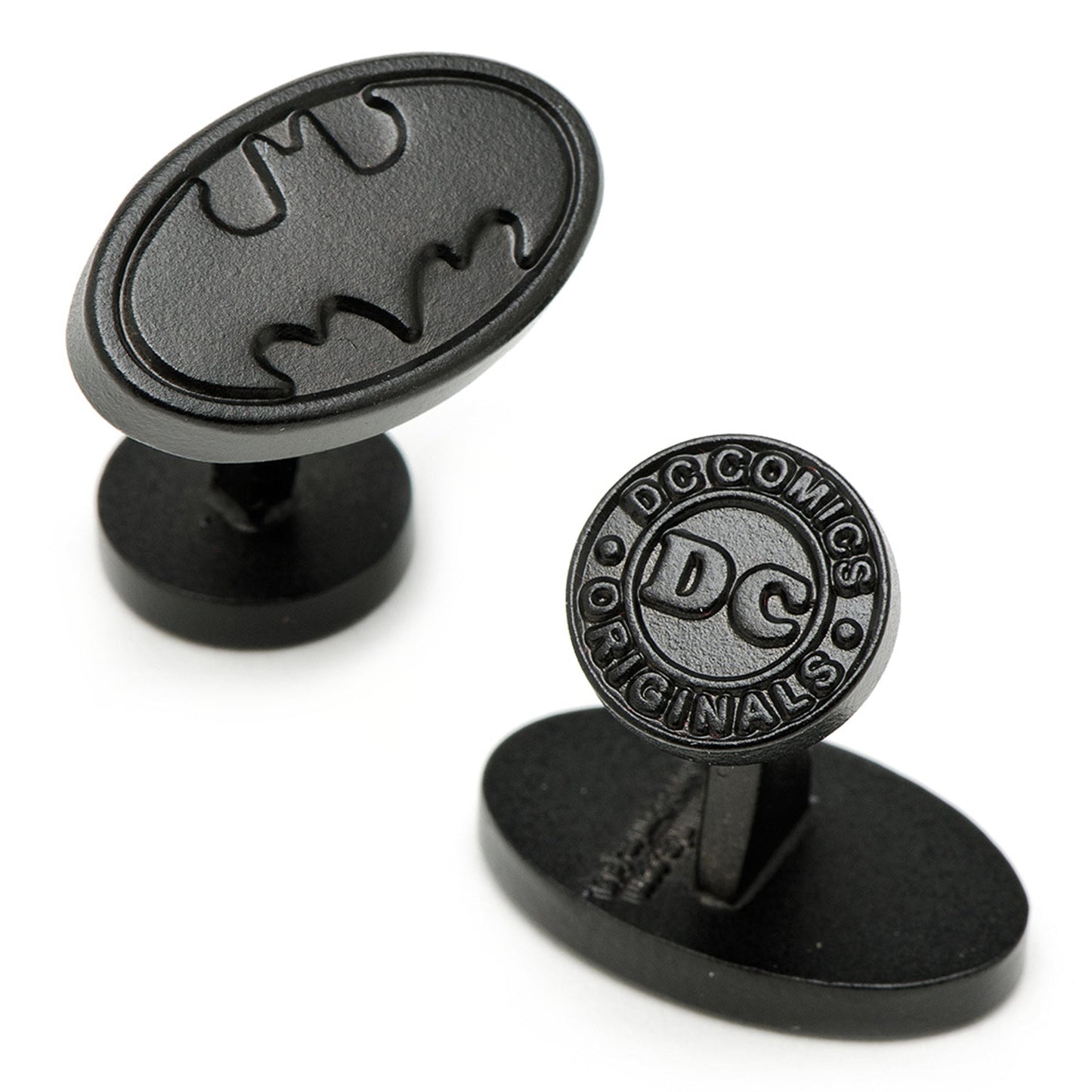 Black cufflinks with Batman logo and DC Comics branding on a white background