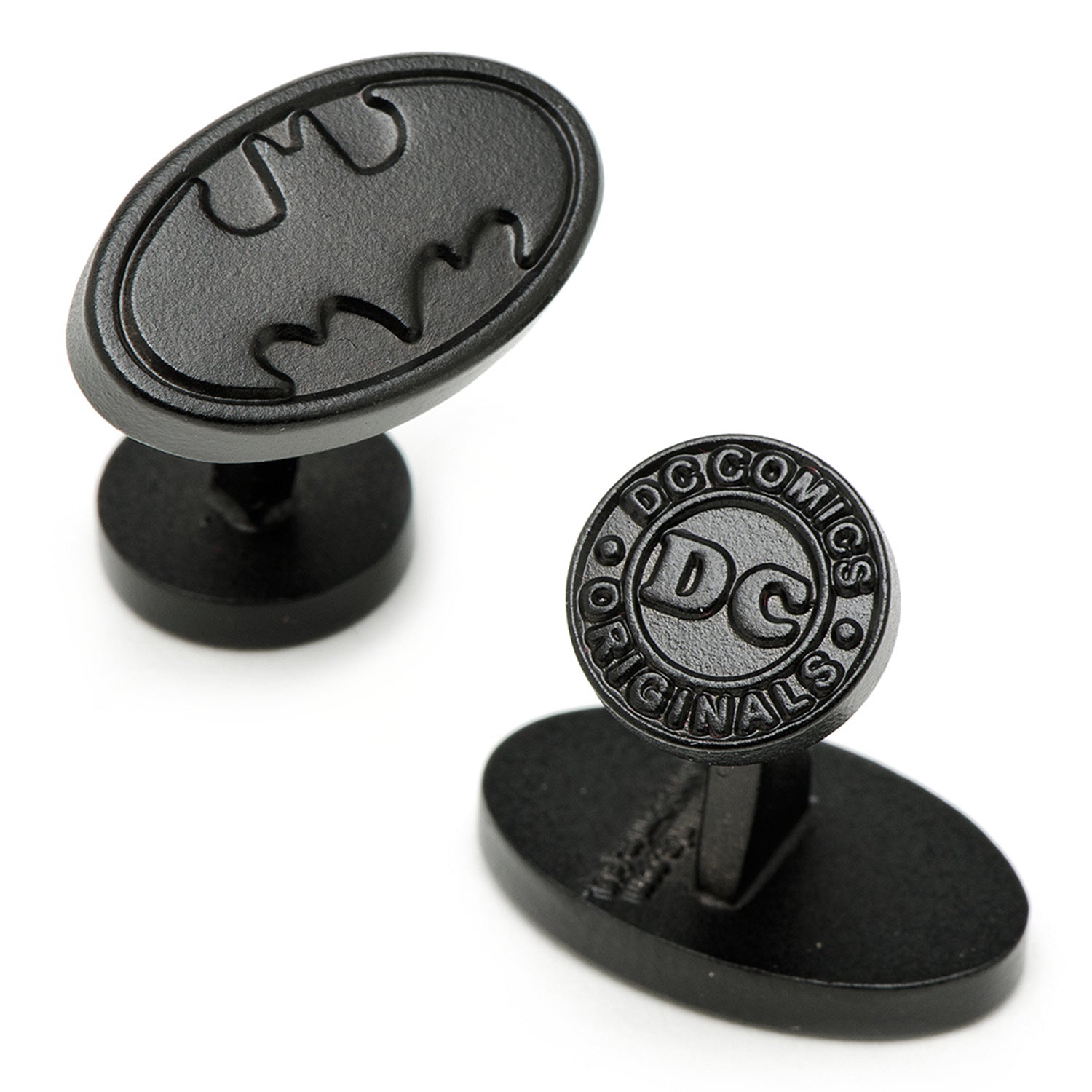 Black cufflinks with Batman logo and DC Comics branding on a white background