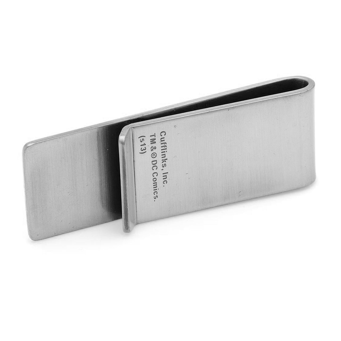 Metallic money clip with engraved text on a white background