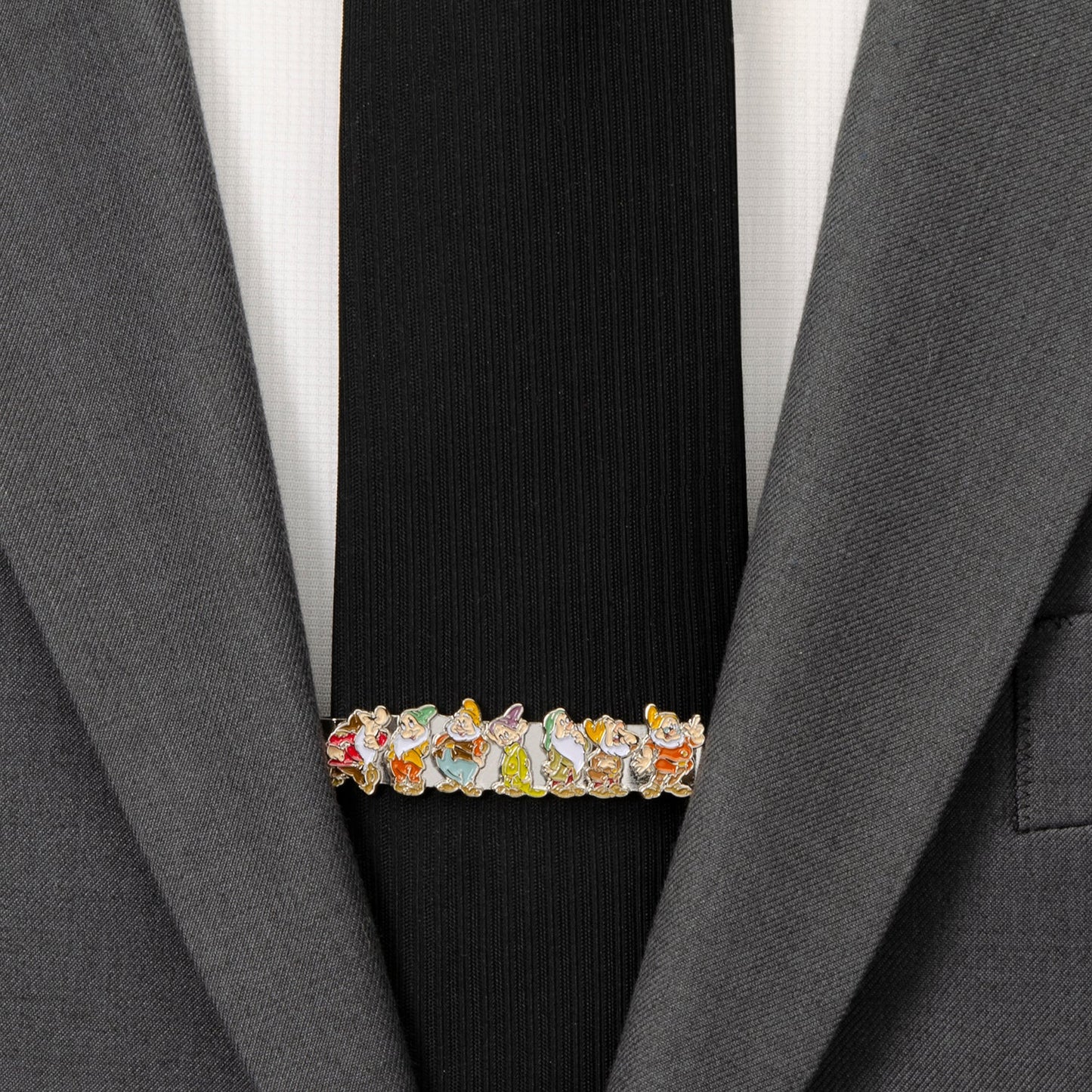 Colorful brooch on a black suit jacket