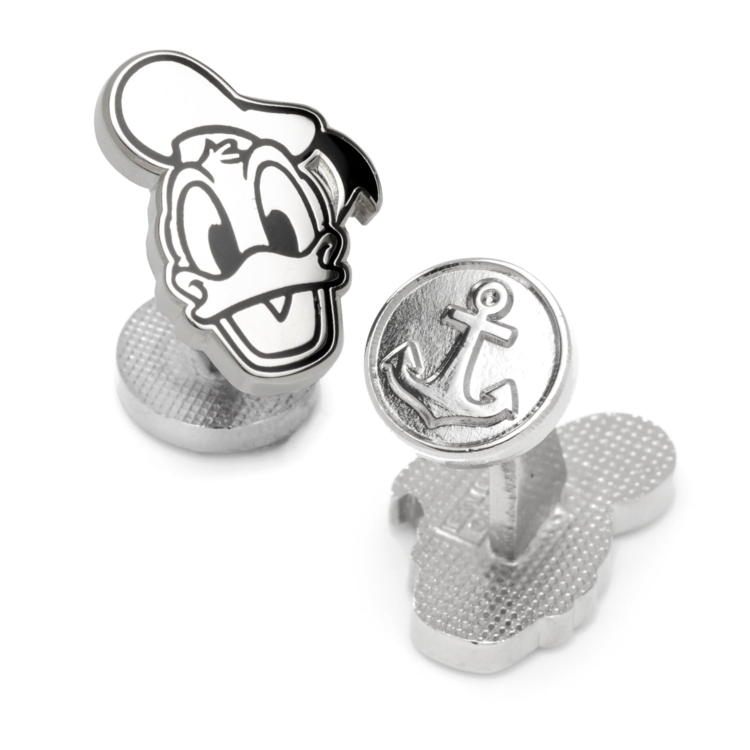 Silver cufflinks with cartoon character and anchor design on a white background