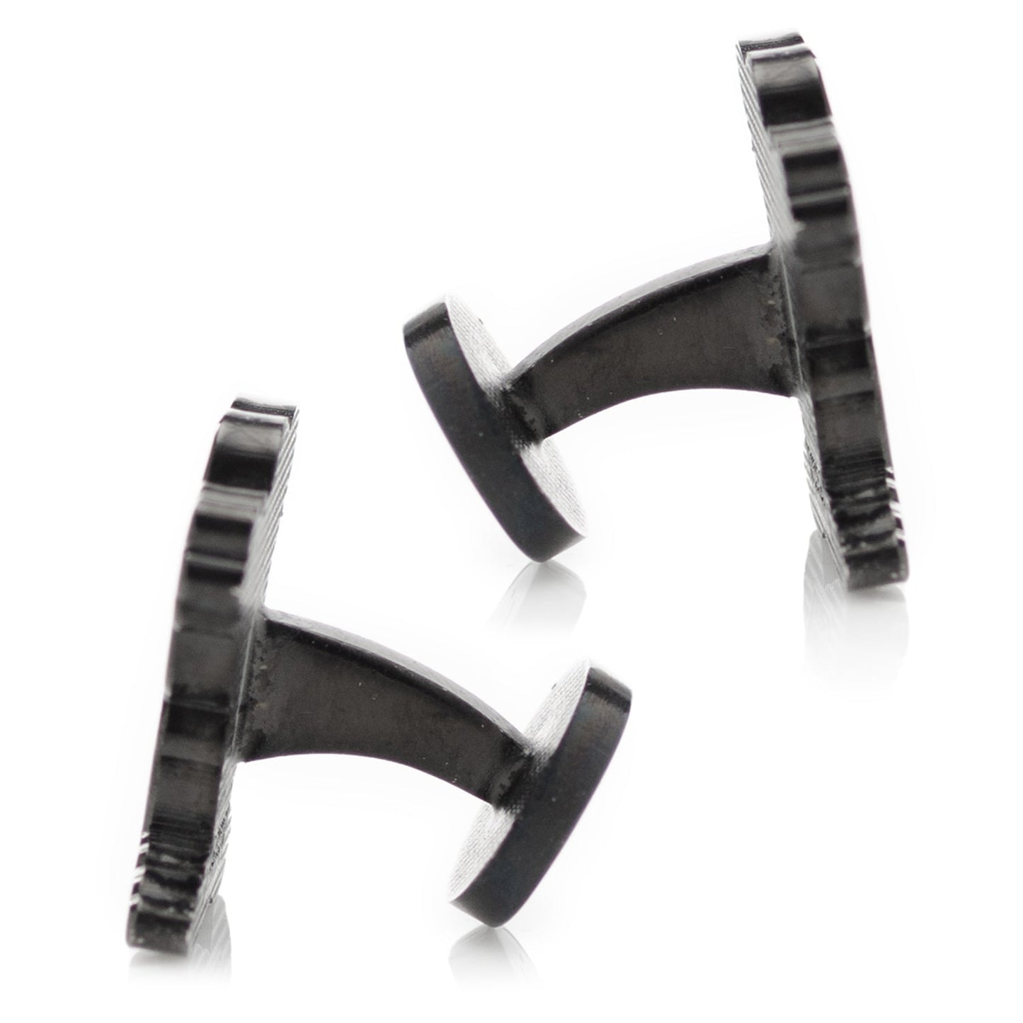 Black and silver cufflinks on a white background
