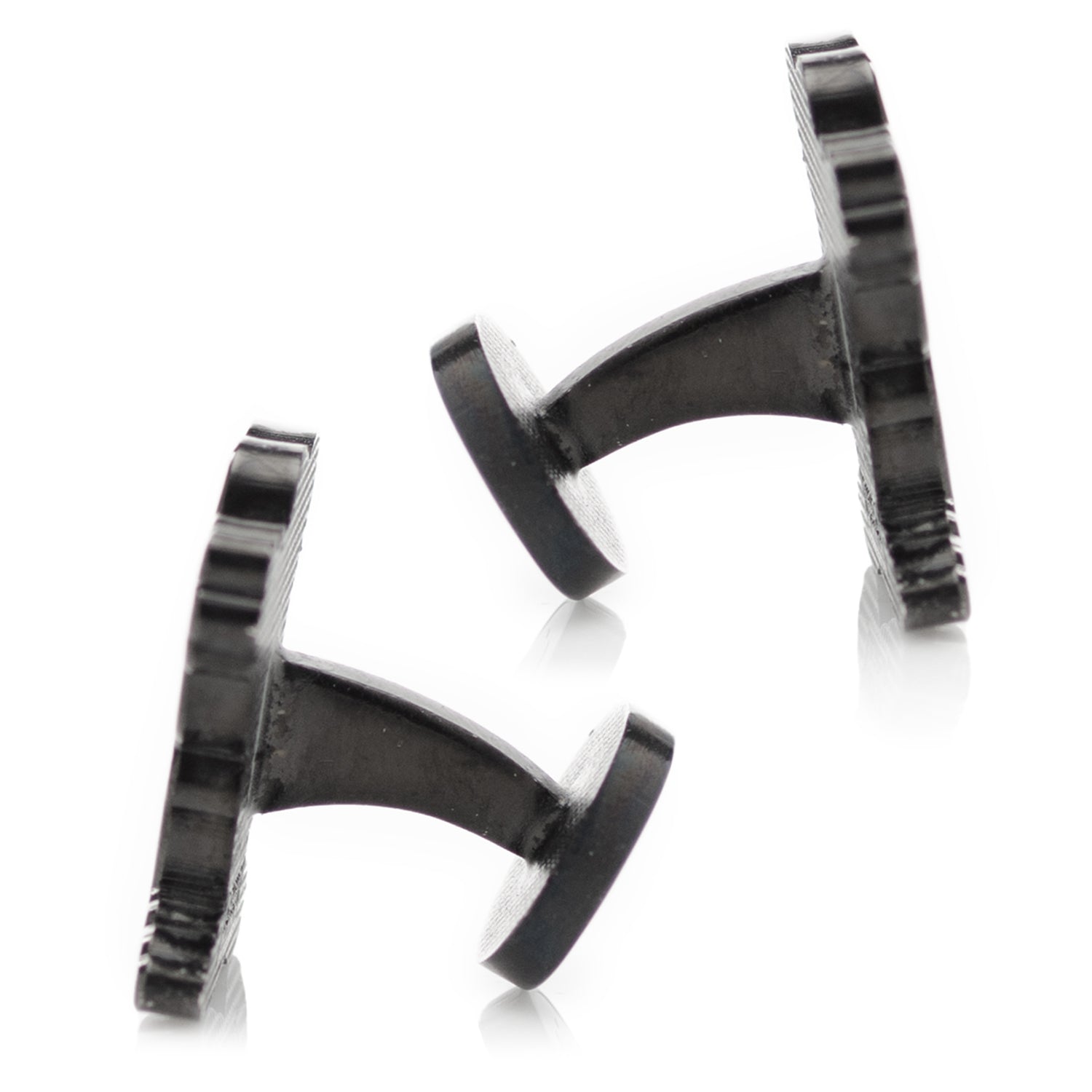 Black and silver cufflinks on a white background