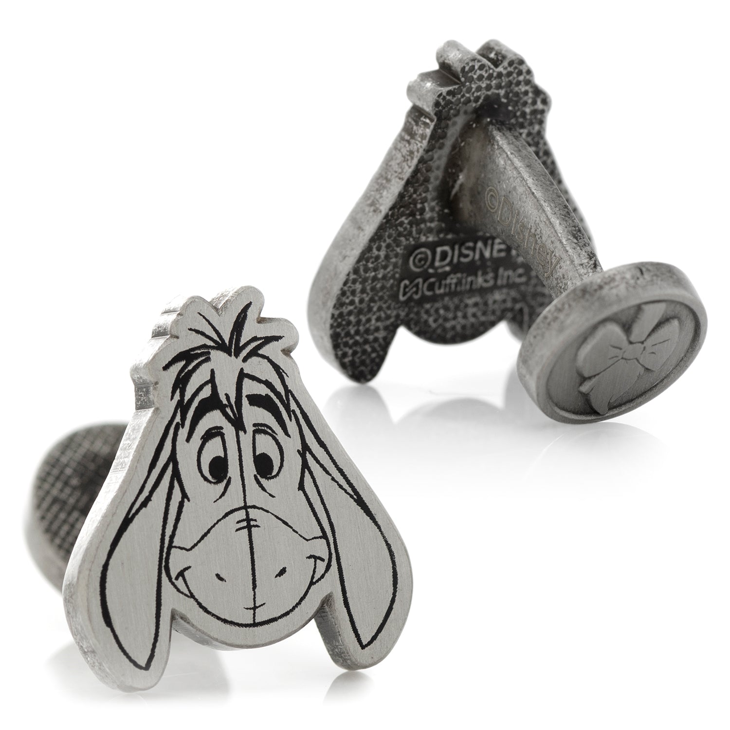 Cufflinks with Eeyore design on a white background