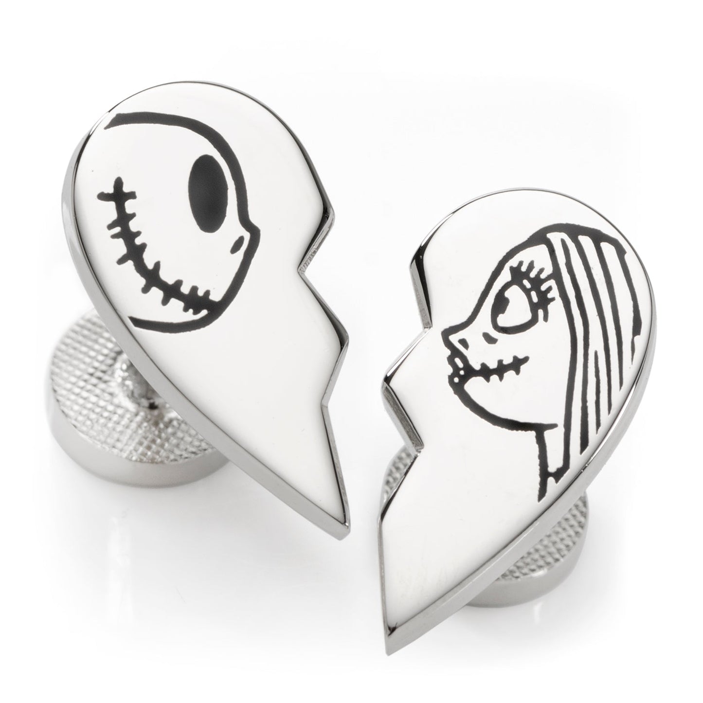 Silver heart-shaped cufflinks with cartoon faces on a white background