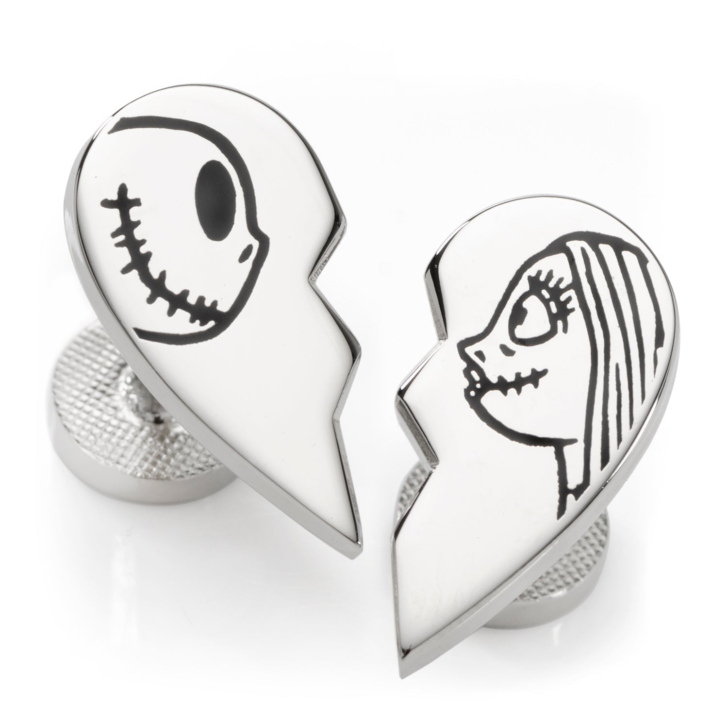 Silver heart-shaped cufflinks with cartoon faces on a white background