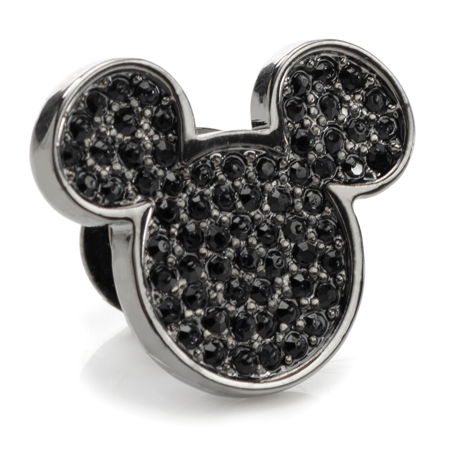 Mickey Mouse head-shaped object with black gemstones on a white background