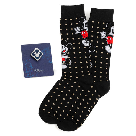 Black socks with white polka dots and Mickey Mouse design, featuring a Disney card on a white background.