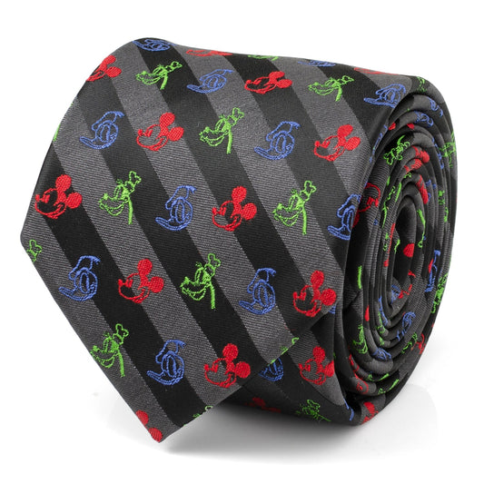 Roll of a tie with colorful patterns on a gray background