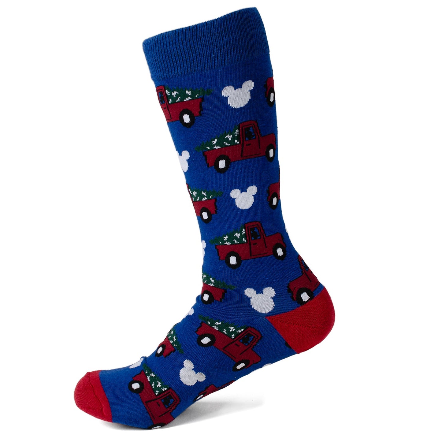 Blue sock with red trucks and white trees pattern on a white background