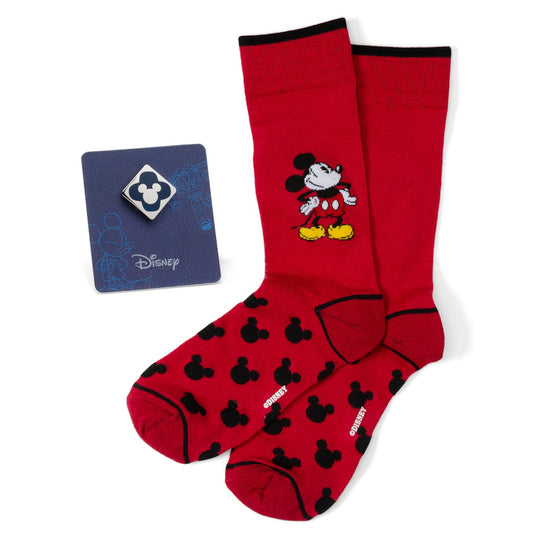 Red socks with black mouse ears design and Disney logo, paired with a blue card featuring the Disney logo.