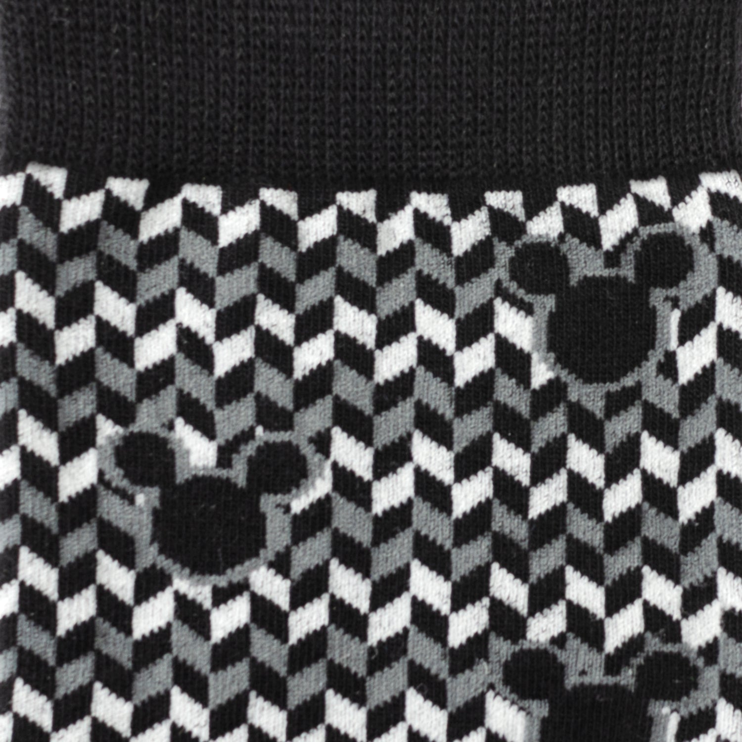 Black and white checkered pattern with Mickey Mouse ears design on a textured background
