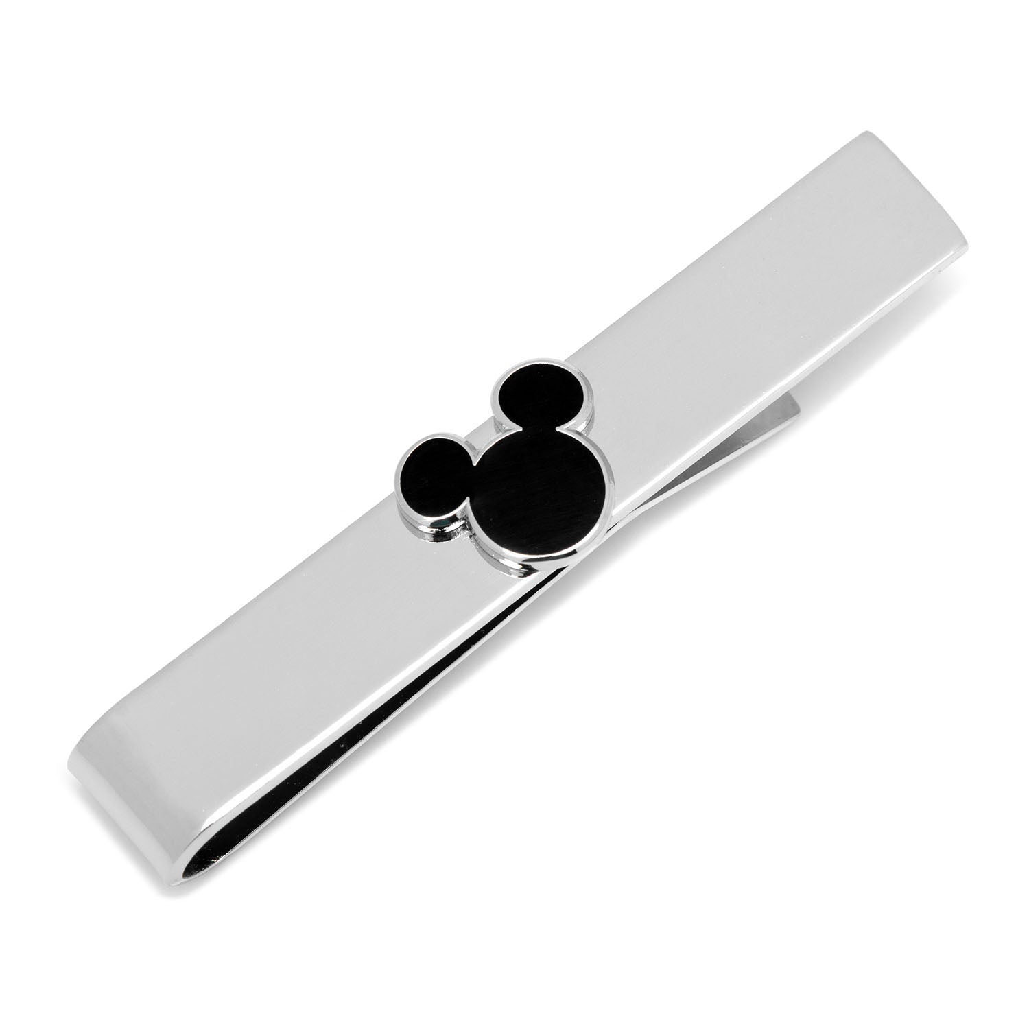 Silver tie clip with black circular design on a white background