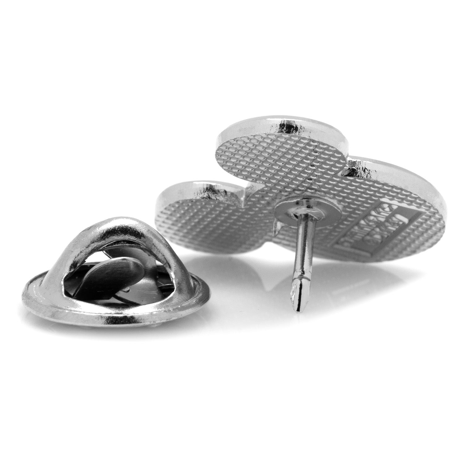Silver pin with a textured design on a white background
