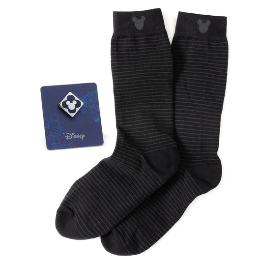 Black striped socks with Mickey Mouse ears and a Disney card on a white background